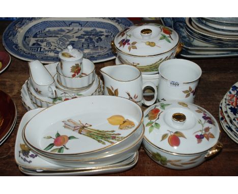 A Royal Worcester ''Evesham'' oven to tableware including three lidded tureens, three flan dishes, preserve pot, two oval cas