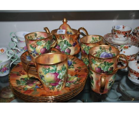 A quantity of Lime House Studio china including six Dinner Plates, Cups and saucers and Teapot, all signed R. Everill