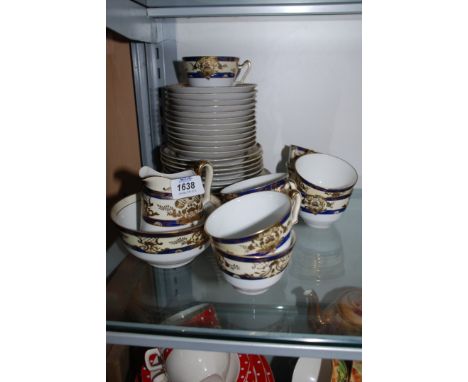 A Noritake Teaset comprising ten Cups, seventeen Saucers, nine Tea Plates, two Cake Plates, Milk Jug and Sugar Bowl.