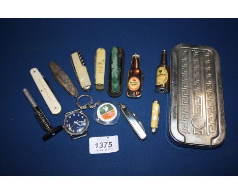 A quantity of miscellanea including pocket Pen Knives, Key Rings, Timex Watch, Dunlop tyre tread depth Gauge, a Rolls Royce R
