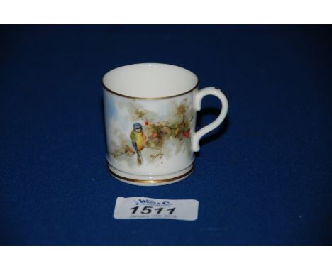 A Royal Worcester miniature Coffee Can decorated with a Blue Tit sitting on a branch, 1 3/4'' tall.
