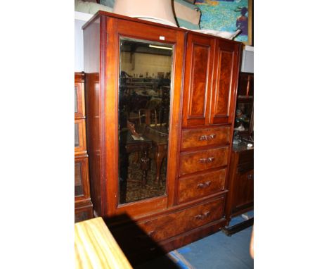 A good Victorian Walnut Compactum Wardrobe having plain top, the left side fitted with full length bevel plate mirrored door 