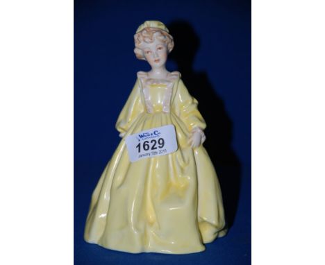 A Royal Worcester figurine, ''Grandmother's Dress''