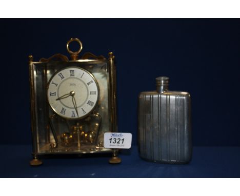 A silver plated Hip Flask, plus a brass cased German Anniversary Clock