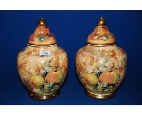 A pair of lidded Pots, both signed to base and to the side, M & A Bloor.  12'' tall