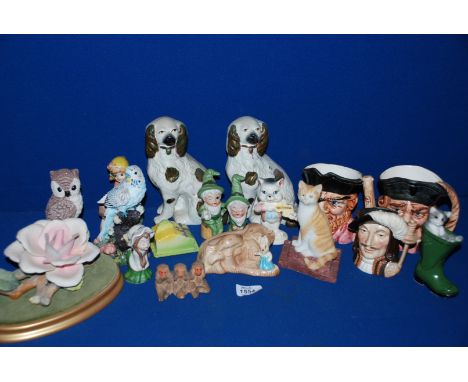 A quantity of ornaments including Sylvac tree trunk posy vase, Royal Doulton 'Athos' character jug, pair of mantle spaniels, 