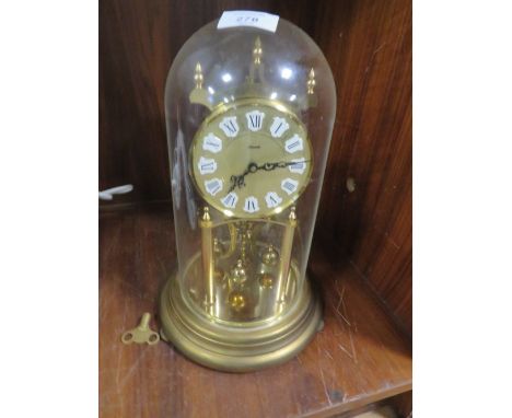 A KUNDO PLASTIC DOME CLOCK 