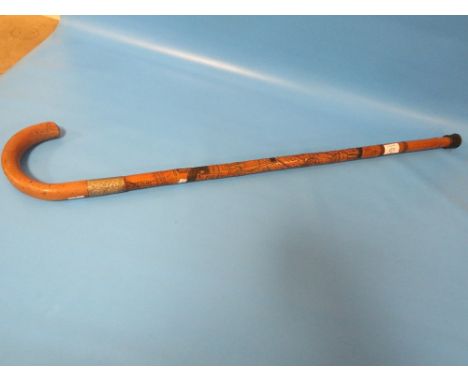 A LATE 19TH CENTURY SWORD STICK BY CRAWLEY &amp; SON OF PETERBOROUGH, THE SHAFT CARVED WITH FIGURES OF SAMURAI WARRIORS 