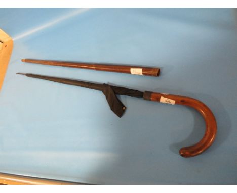 AN UNUSUAL EDWARDIAN WALKING STICK UMBRELLA 