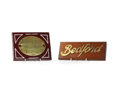 Two brass plaques, the first, c.1870 inscribed 'James Court' within an oval, mounted on a wooden board,15 x 19cm,together wit