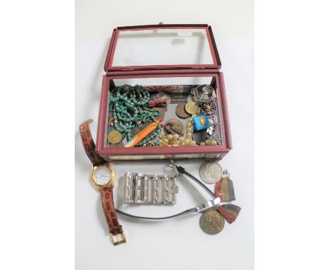 A box of medals on ribbons, costume jewellery, vintage firecrackers, coins, watches etc 