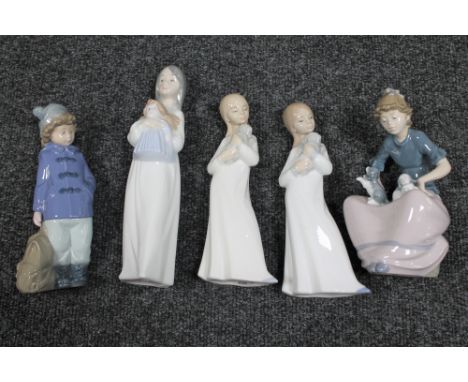 Five Nao figures in nightdress, etc 