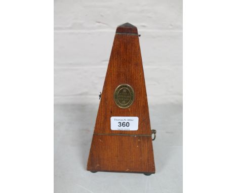 An early 20th century metronome by The John Church Company 