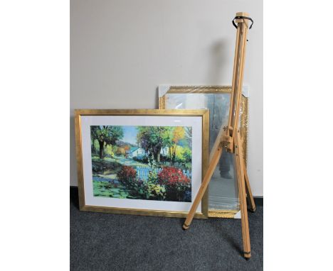 An artist's easel, gilt framed print of a dwelling and a gilt framed mirror 