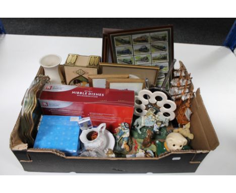 A box of assorted figures, vintage tin, brass dishes, framed train cigarette cards, dressing table set etc 
