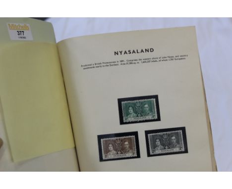 King George VI Coronation mint Commonwealth stamp collection in Stanley Gibbons album, sets of 1937 stamps from over 50 count