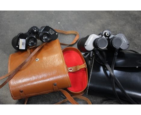 Two pairs of cased binoculars, Super Zenith 7 x 50's and Nipole 10 x 50