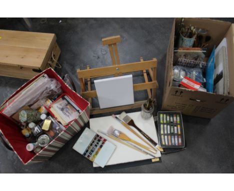 Two boxes of art materials, easel, paint brushes, sketch pads, paints, etc. 