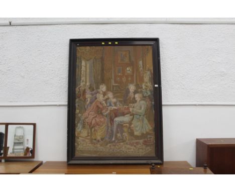 A 19th century needlework depicting a card playing or gambling scene, height in frame 150 cm, width 110 cm  