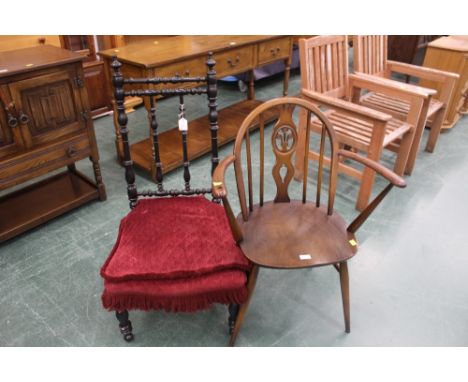 Ercol style spindle back carver chair with Prince of Wales plume and bobbin turned ebonised chair with maroon upholstery 