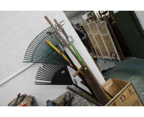 Garden tools, rakes, hoe, axe etc (tea chest not included)