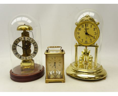 Late 20th century brass skeleton clock striking on the hour on plinth with glass dome (H29cm), 'Master Quartz' torsion type c