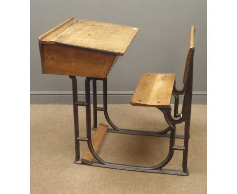 Vintage oak and cast iron school desk, hinged lid, folding seat, W67cm, H87cm, D90cm