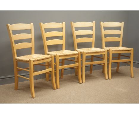 Set four beech ladder back chairs, rush seats, square tapering legs, turned stretchers