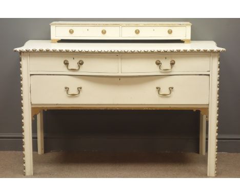 French style dressing table, two small trinket drawers above serpentine front, two drawers, cream and gold finish, W122cm, H9