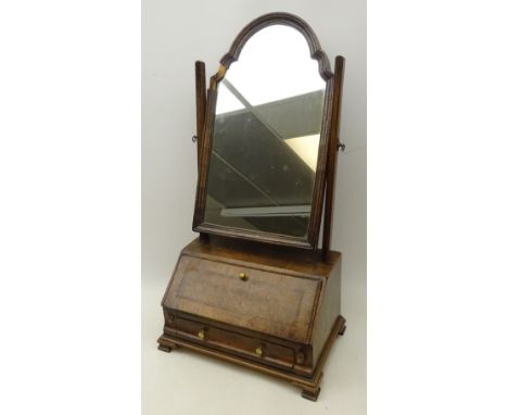 19th century mahogany toilet mirror, the moulded arched plate over a fall front base with fitted interior above a single draw