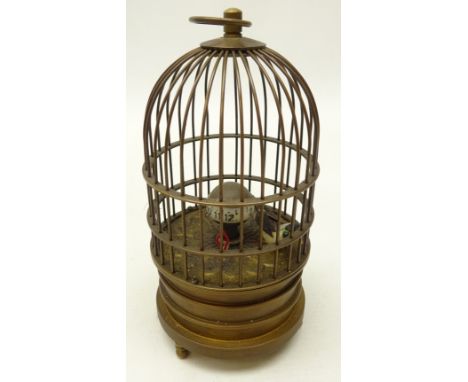 Brass bird cage novelty mechanical clock with moving feather bird and flower patterned interior