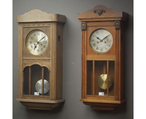 Large early 20th century oak cased wall clock, another oak cased wall clock and a stained beech cased 31-day wall clock