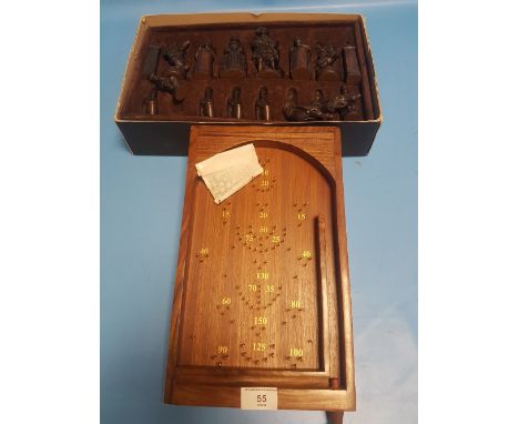 A WOODEN BAGATELLE AND A BOX OF CHESS PIECES