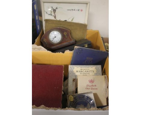 TWO TRAYS OF COLLECTABLES TO INCLUDE A MANTEL CLOCK, COMMEMORATIVE BOOKS ETC.