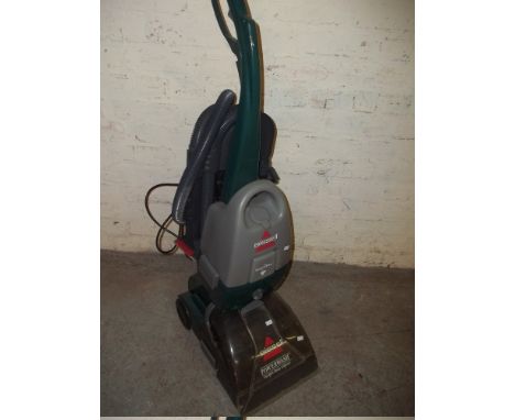 A BISSELL POWERWASH CARPET CLEANER