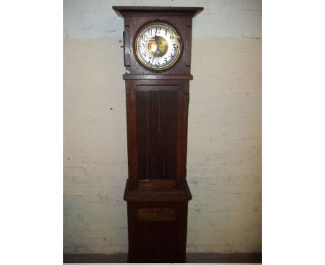 AN OAK FLOOR STANDING GRANDFATHER CLOCK