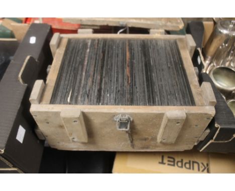 TWO WOODEN CASES OF GLASS SLIDES (5604A & 5604B)The plates to one box are mostly portrait images.  They generally seem to be 