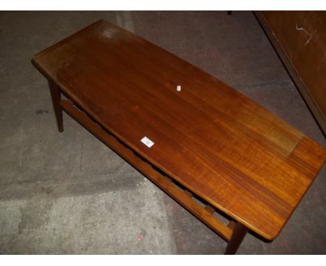 A RETRO TEAK COFFEE TABLE WITH STRETCHER SHELF (SOME WATER DAMAGE)