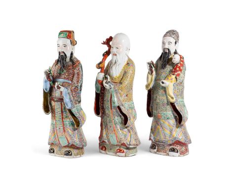 A SET OF THREE CHINESE PORCELAIN FAMILLE ROSE SANXING FIGURES20TH CENTURYof Fu, Lu and Shou, impressed seal marks (3)58cm hig