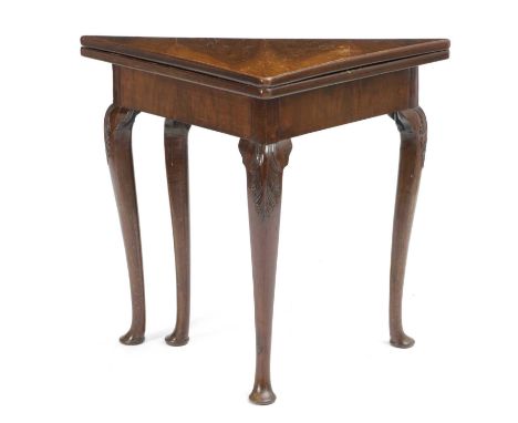 A WALNUT CORNER CARD TABLE IN GEORGE II STYLE, 19TH CENTURYthe fold-over top revealing a baize lined playing surface with sun
