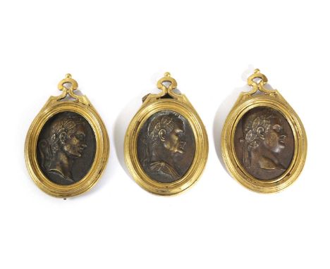 A SET OF THREE BRONZE GRAND TOUR RELIEF PLAQUESITALIAN OR FRENCH, EARLY 19TH CENTURYeach with a profile bust portrait of Roma