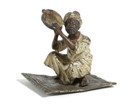 AN AUSTRIAN COLD PAINTED BRONZE FIGURE OF AN ARAB MUSICIANIN THE MANNER OF FRANZ BERGMAN, LATE 19TH CENTURYthe bearded man sq