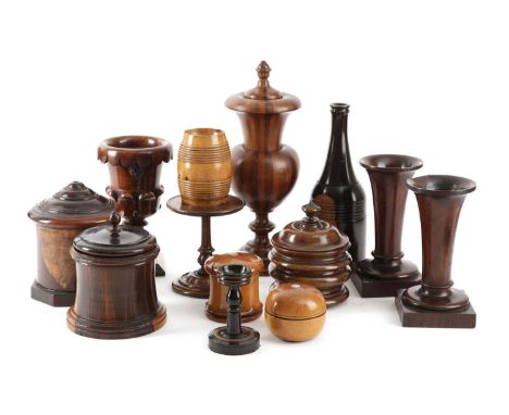 A COLLECTION OF TREEN19TH CENTURY AND LATERcomprising: a lignum vitae bottle, two lignum vitae string boxes, a pair of trumpe