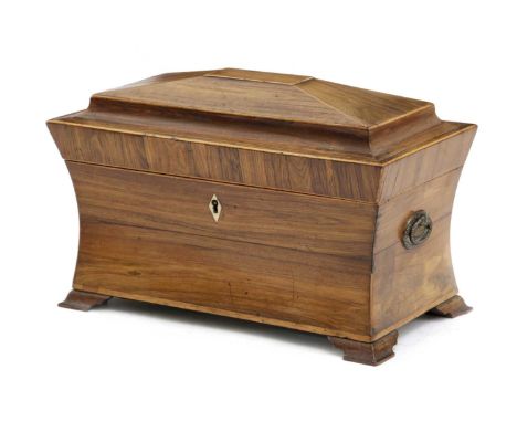 λ A REGENCY KINGWOOD SARCOPHAGUS TEA CHESTEARLY 19TH CENTURYwith boxwood edging, the caddy top enclosing a pair of hinged lif