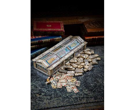 A NAPOLEONIC BONE PRISONER OF WAR GAMES BOXEARLY 19TH CENTURYof sarcophagus form, the sliding cover and sides with painted wa