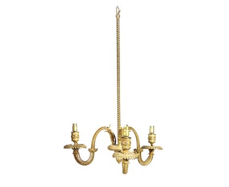 A PAIR OF GILT BRASS THREE LIGHT CHANDELIERSLATE 19TH CENTURYeach with a ropetwist stem, supporting three scrolling branches 