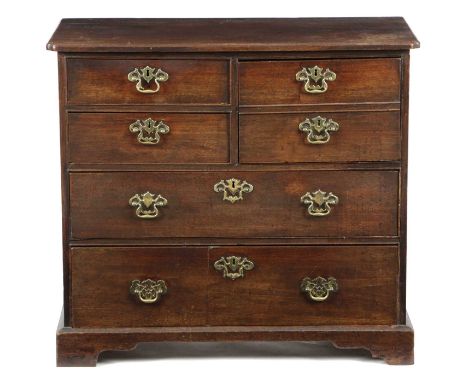 AN UNUSUAL GEORGE II MAHOGANY CHESTC.1750-60with a caddy moulded hinged top, with cusped corners above two short and one deep