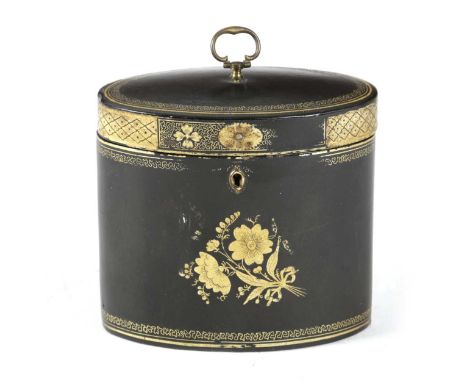 A GEORGE III EBONISED AND GILT PAPIER-MACHE OVAL TEA CADDYC.1790-1800with a single lidded interior, the front decorated with 