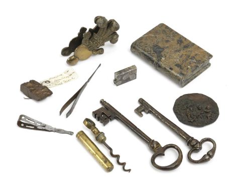 AN ITALIAN MARBLE GRAND TOUR BOOKEARLY 19TH CENTURYanother miniature marble book, two bronze keys, possibly 17th century, a b