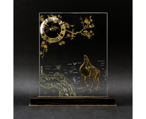 French Art Deco Glass and Brass Mantle Clock. Depicts a deer near water, applied brass. Marked "Just France" to dial. Some we